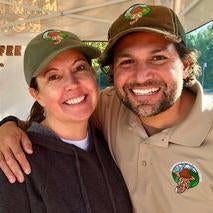 Photo of Tracie and Steve Shatkin posing at their pop-up shop.